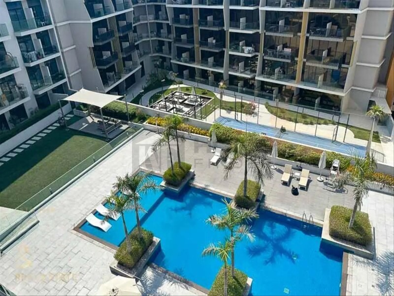 Apartment for Sale in Oxford Residence 1 - Jumeirah Village Circle, Dubai - Pool view | Furnished | Top floor at 739000 AED