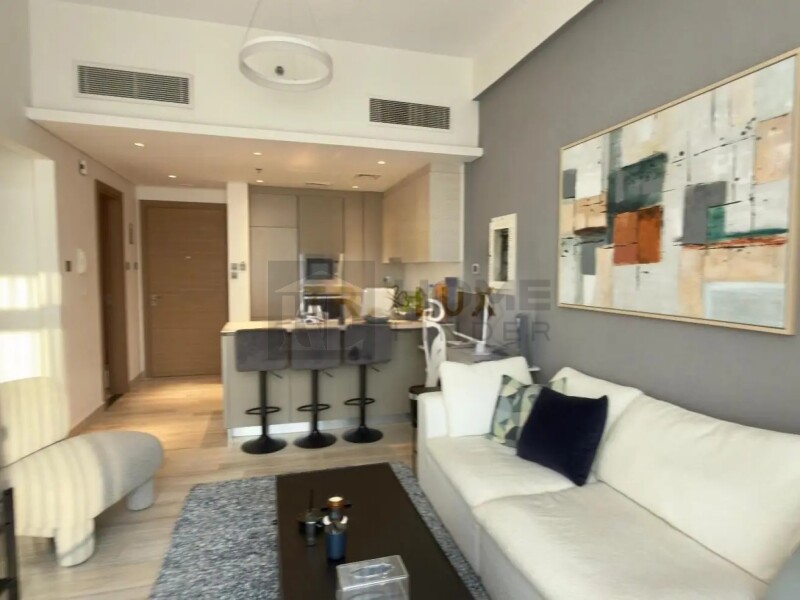 Apartment for Sale in Oxford Residence 2 - Jumeirah Village Circle, Dubai - Pool View | Sunny One-Bedroom | Fully Equipped at 1090000 AED